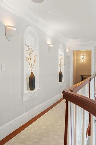 a spacious bedroom with a bed and a chair