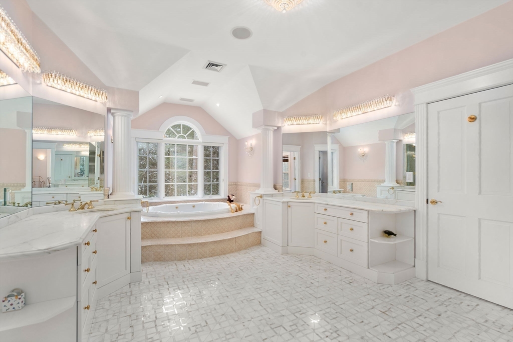 5 Hamlins Crossing West Dover, MA 02030 - Photo 27 of 40 a large bathroom with a granite countertop double vanity sink a bathtub and window