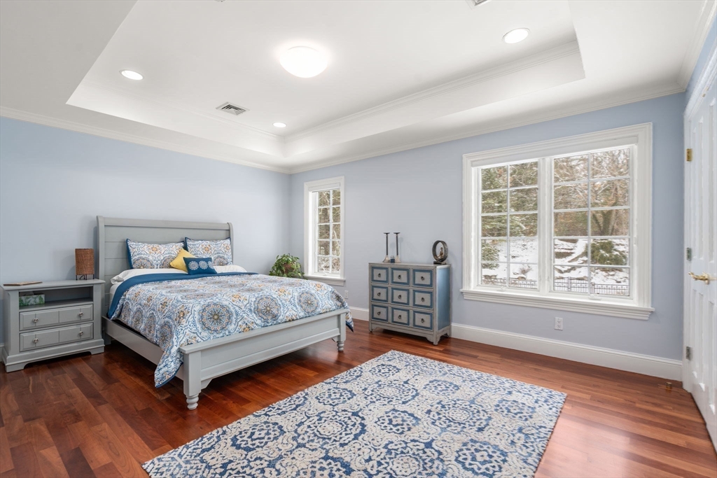 5 Hamlins Crossing West Dover, MA 02030 - Photo 30 of 40 a bedroom with a bed and wooden floor