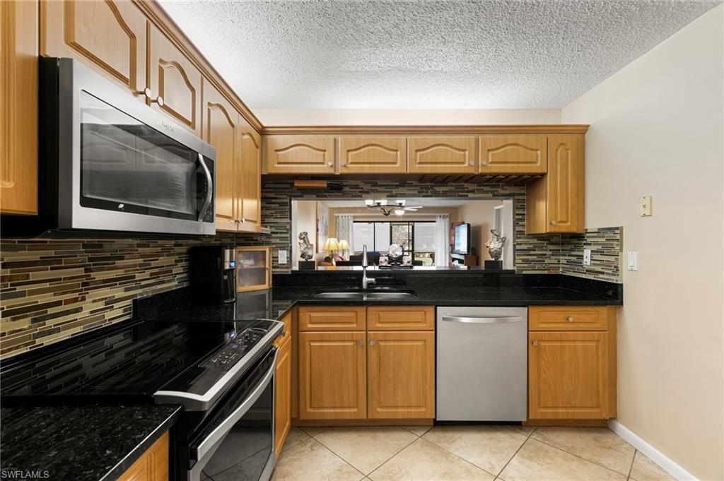 256 Pebble Beach Circle, Unit D103 Naples, FL 34113 - Photo 16 of 31 Gallery Image 16