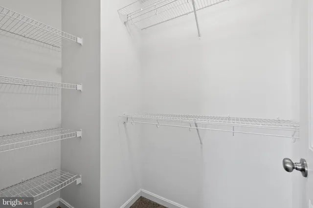 a view of a room with racks on the wall