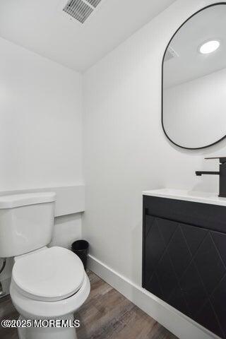 7 Kaylen Place Hazlet, NJ 07730 - Photo 18 of 22 a bathroom with a toilet and a mirror
