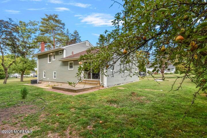 7 Kaylen Place Hazlet, NJ 07730 - Photo 8 of 22 a view of a backyard with large trees