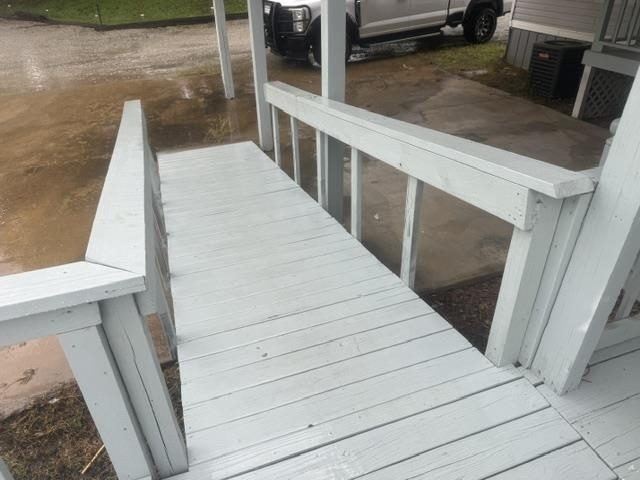 1100 Pine Top Road Toone, TN 38381 - Photo 27 of 40 Wood-finish ramp with painted handrails