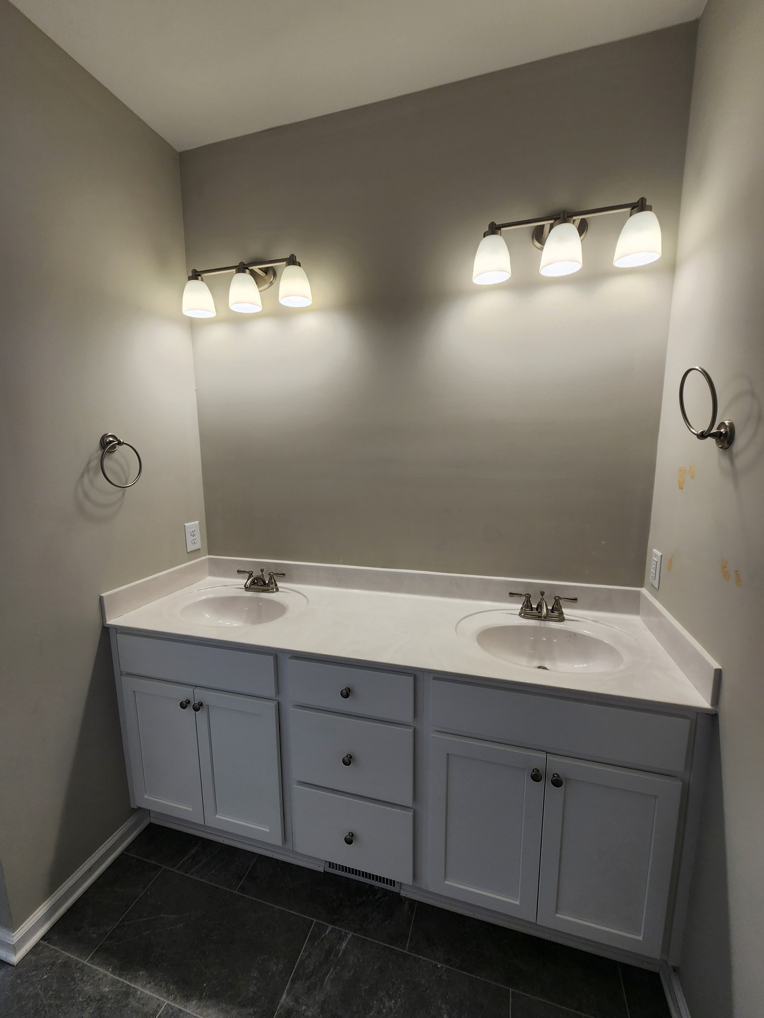 7687 Covington Road White House, TN 37188 - Photo 11 of 16 a bathroom with a double vanity sink and a mirror