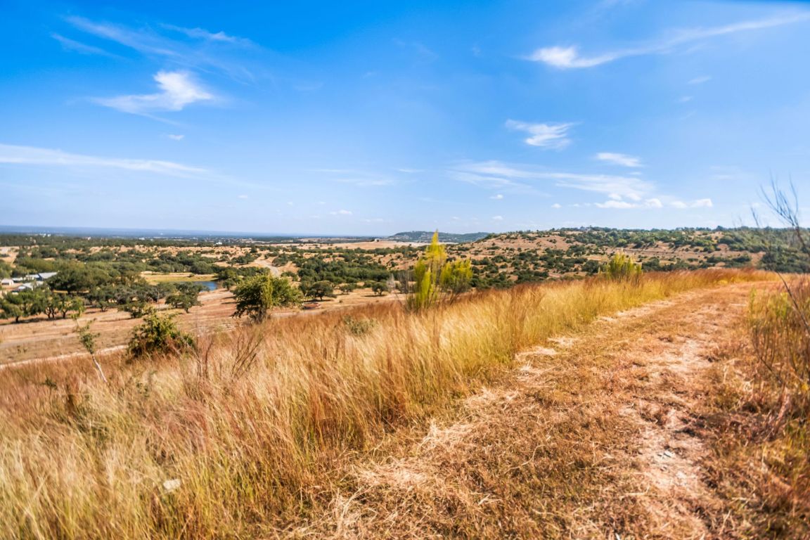 226 South Walnut Springs Road Johnson City, TX 78636 - Photo 12 of 26 a view of a lake view
