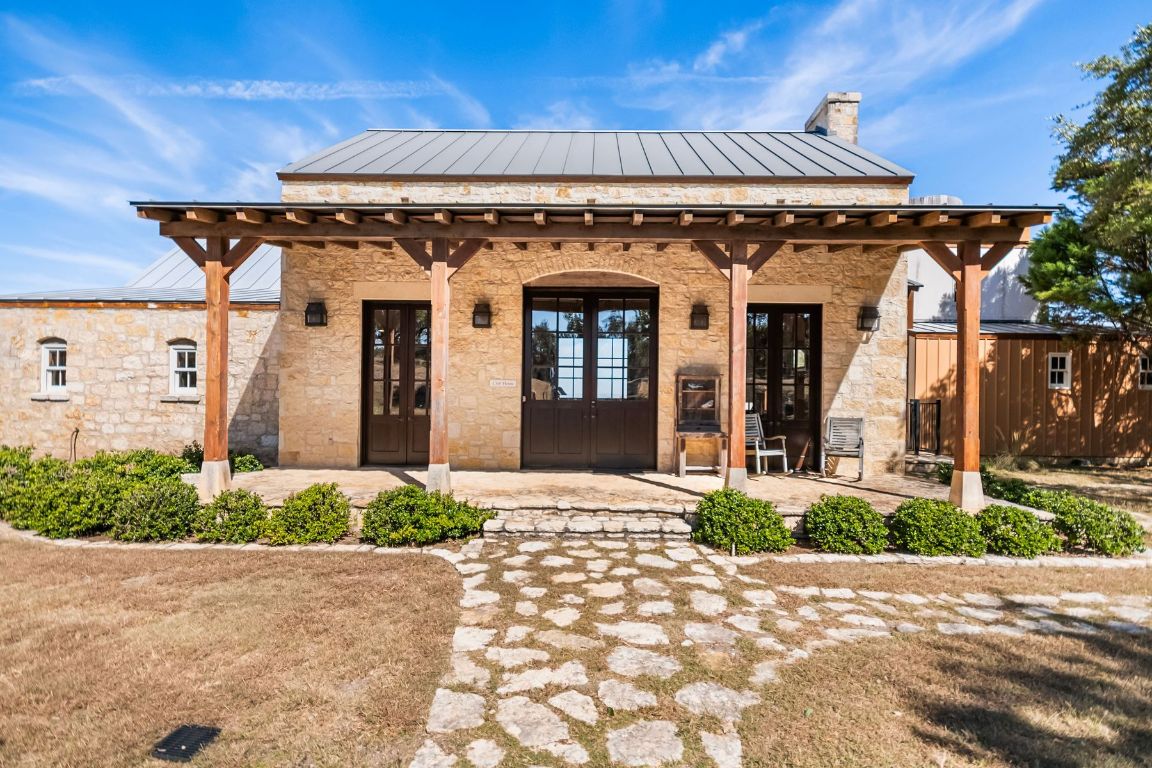 226 South Walnut Springs Road Johnson City, TX 78636 - Photo 22 of 26 a view of a building with a street