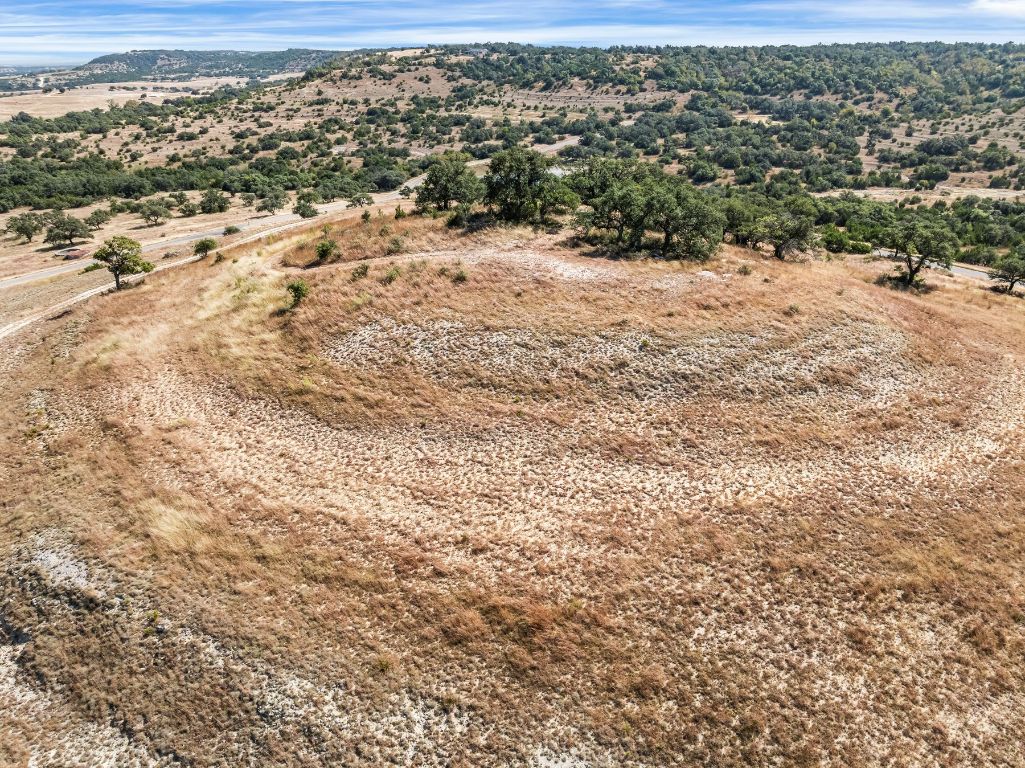 226 South Walnut Springs Road Johnson City, TX 78636 - Photo 4 of 26 an aerial view of residential houses with outdoor space