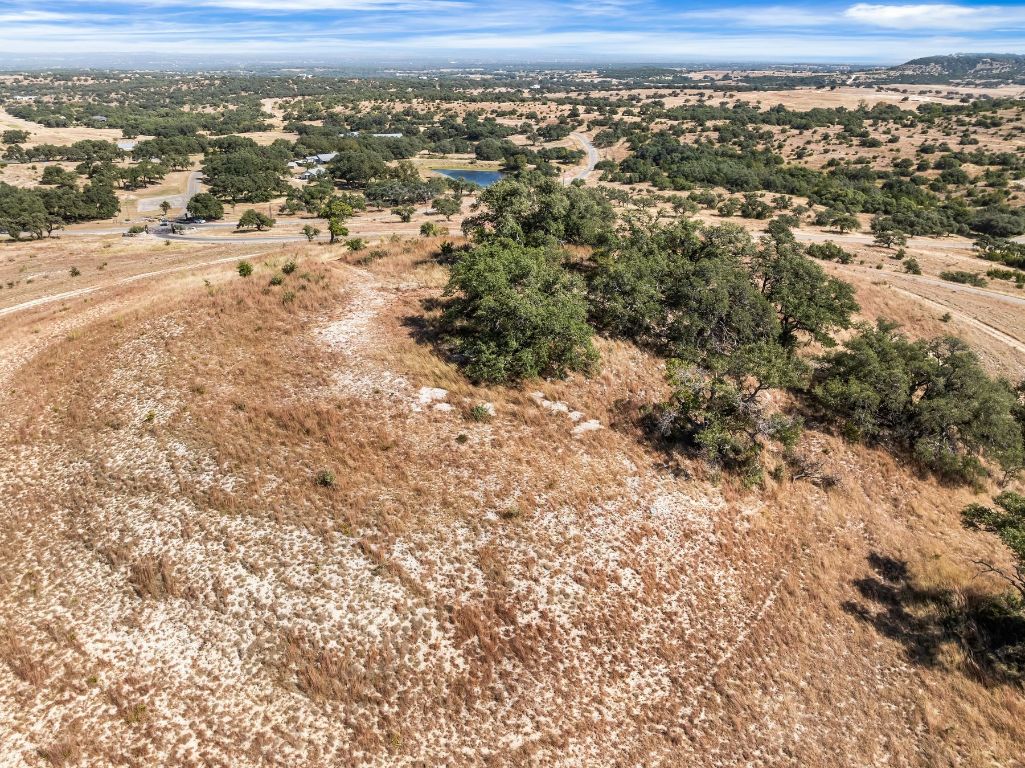 226 South Walnut Springs Road Johnson City, TX 78636 - Photo 5 of 26 an aerial view of residential houses with outdoor space