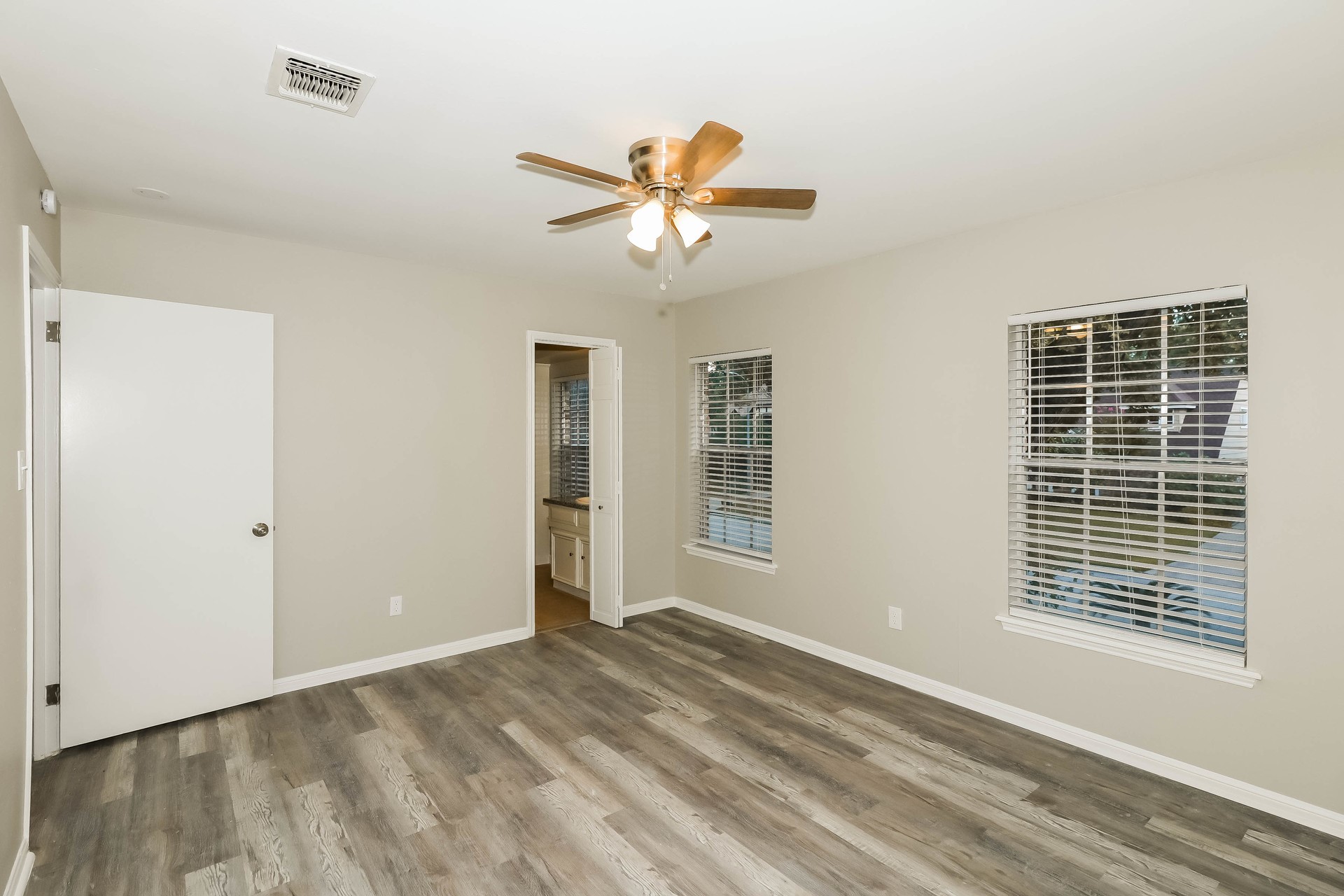1506 Castlerock Road Houston, TX 77090 - Photo 12 of 23 a view of an empty room with a window