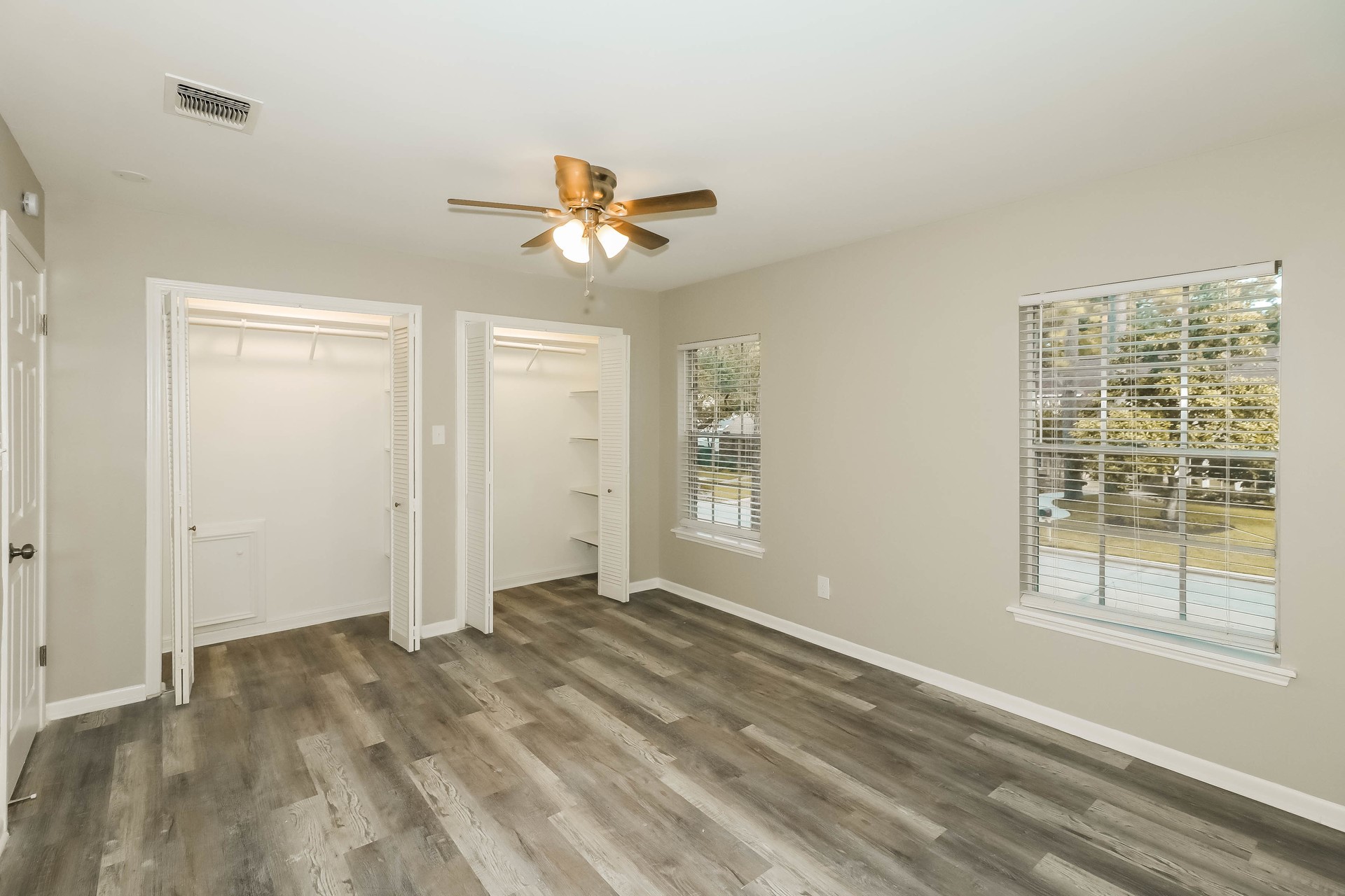 1506 Castlerock Road Houston, TX 77090 - Photo 15 of 23 a view of empty room with window and ceiling fan