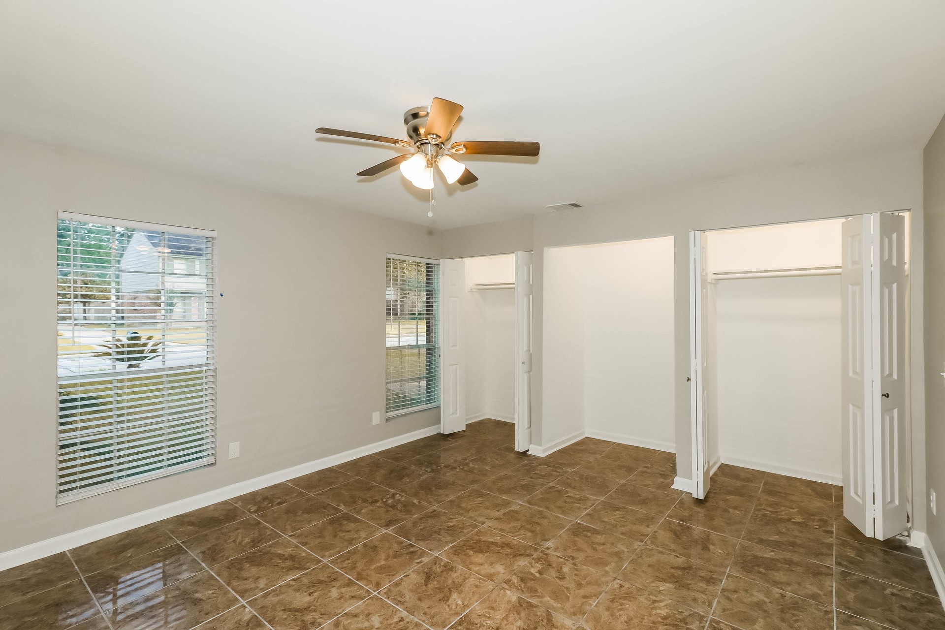 1506 Castlerock Road Houston, TX 77090 - Photo 16 of 23 a view of an empty room with a window