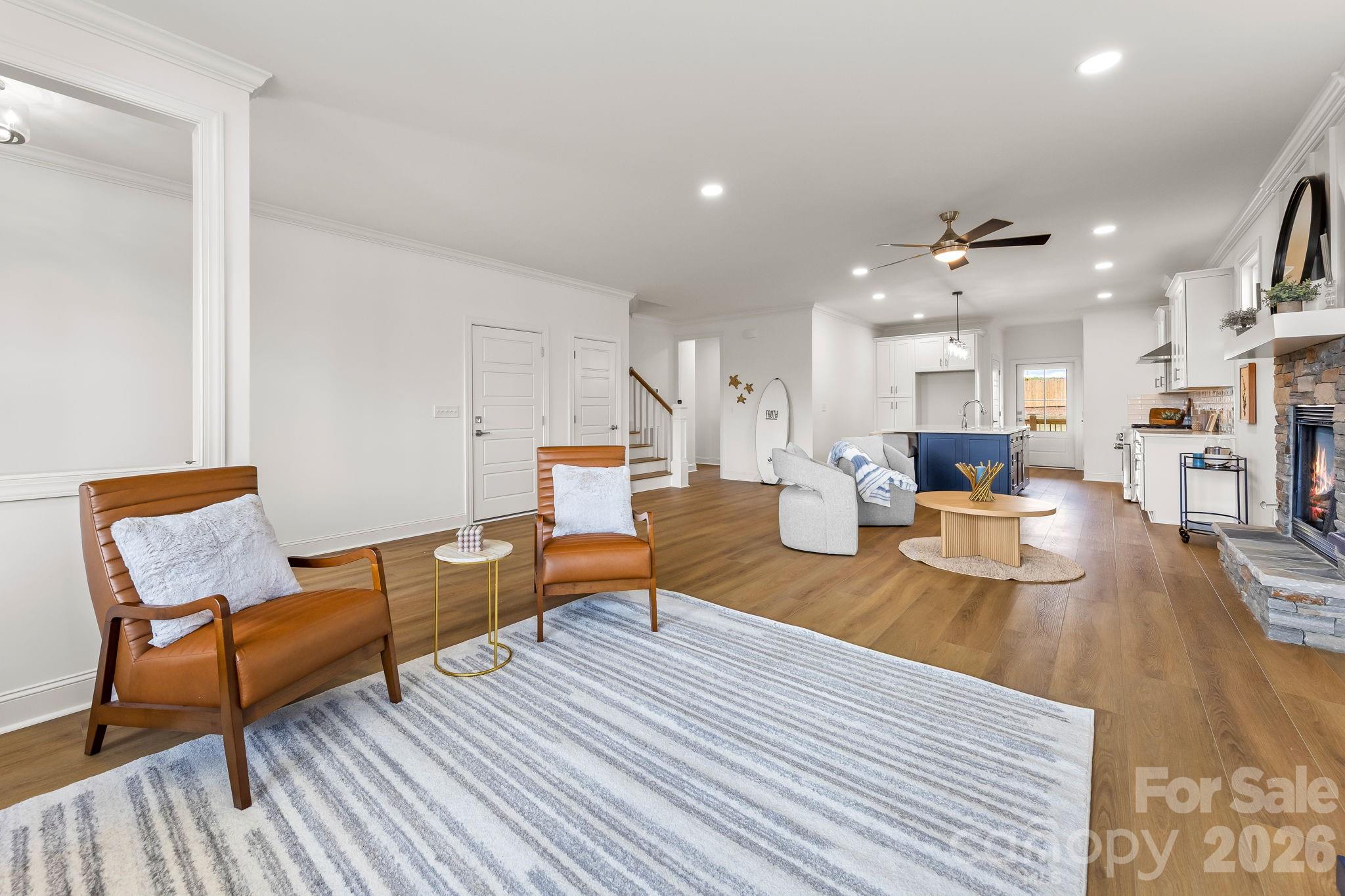 8078 Blackwood Road Denver, NC 28037 - Photo 11 of 48 a living room with furniture and a wooden floor