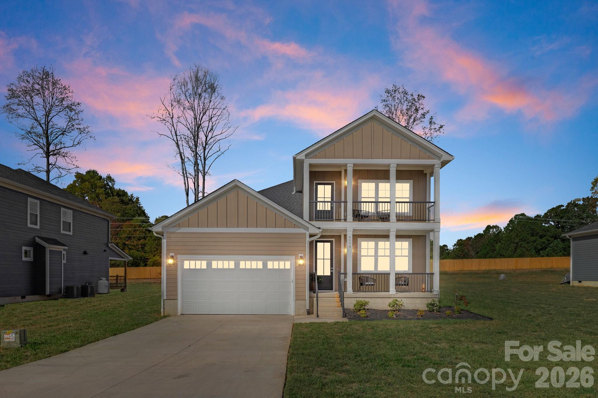 8078 Blackwood Road Denver, NC 28037 - Photo 2 of 48 a front view of a house with a yard