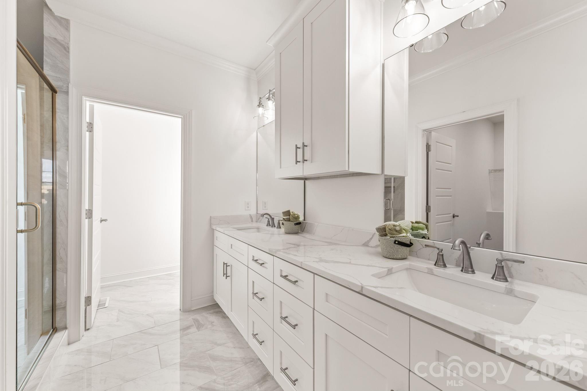 8078 Blackwood Road Denver, NC 28037 - Photo 27 of 48 a bathroom with a granite countertop sink and a mirror