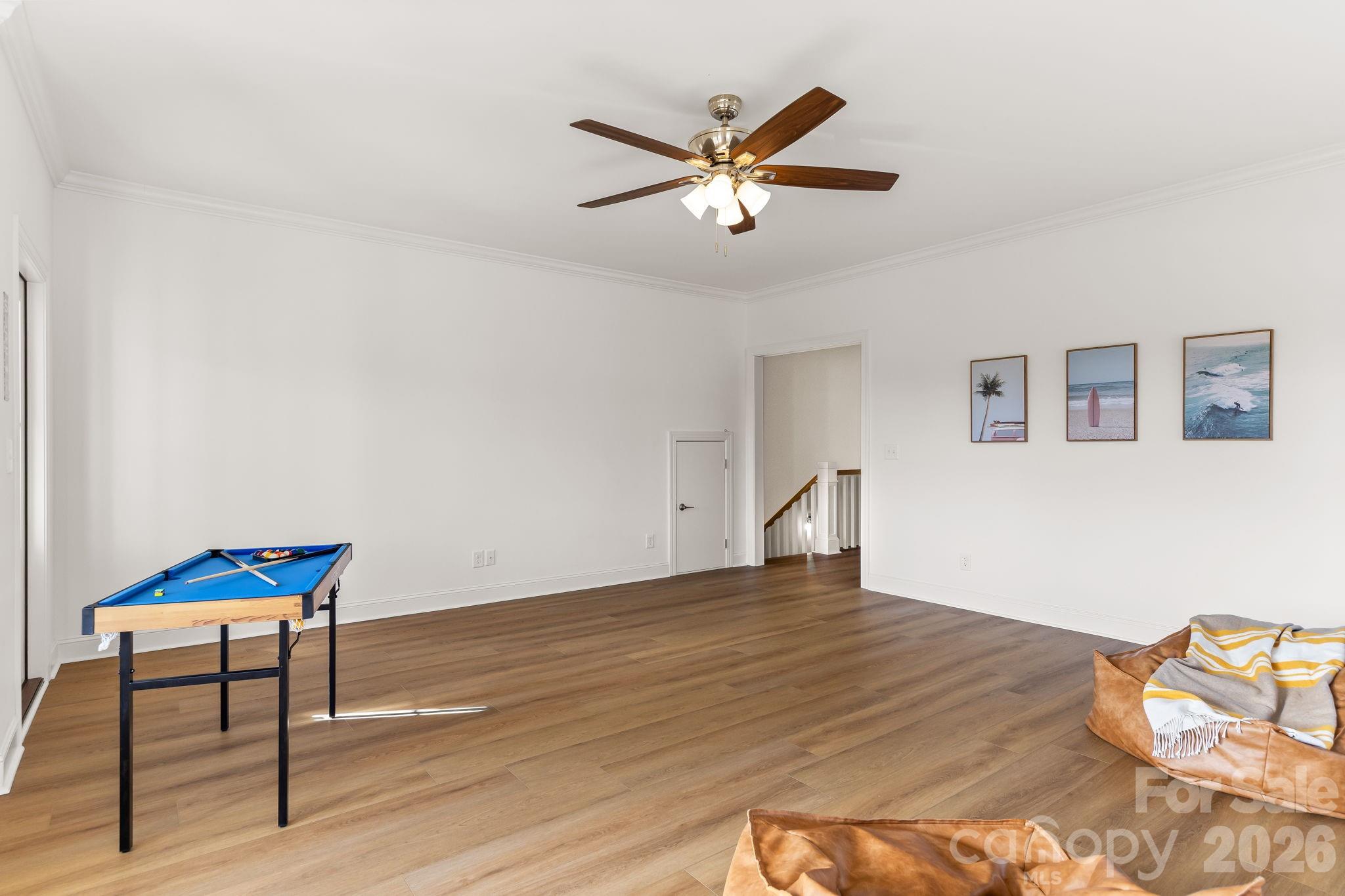 8078 Blackwood Road Denver, NC 28037 - Photo 34 of 48 a view of a livingroom with a dinning table and chair