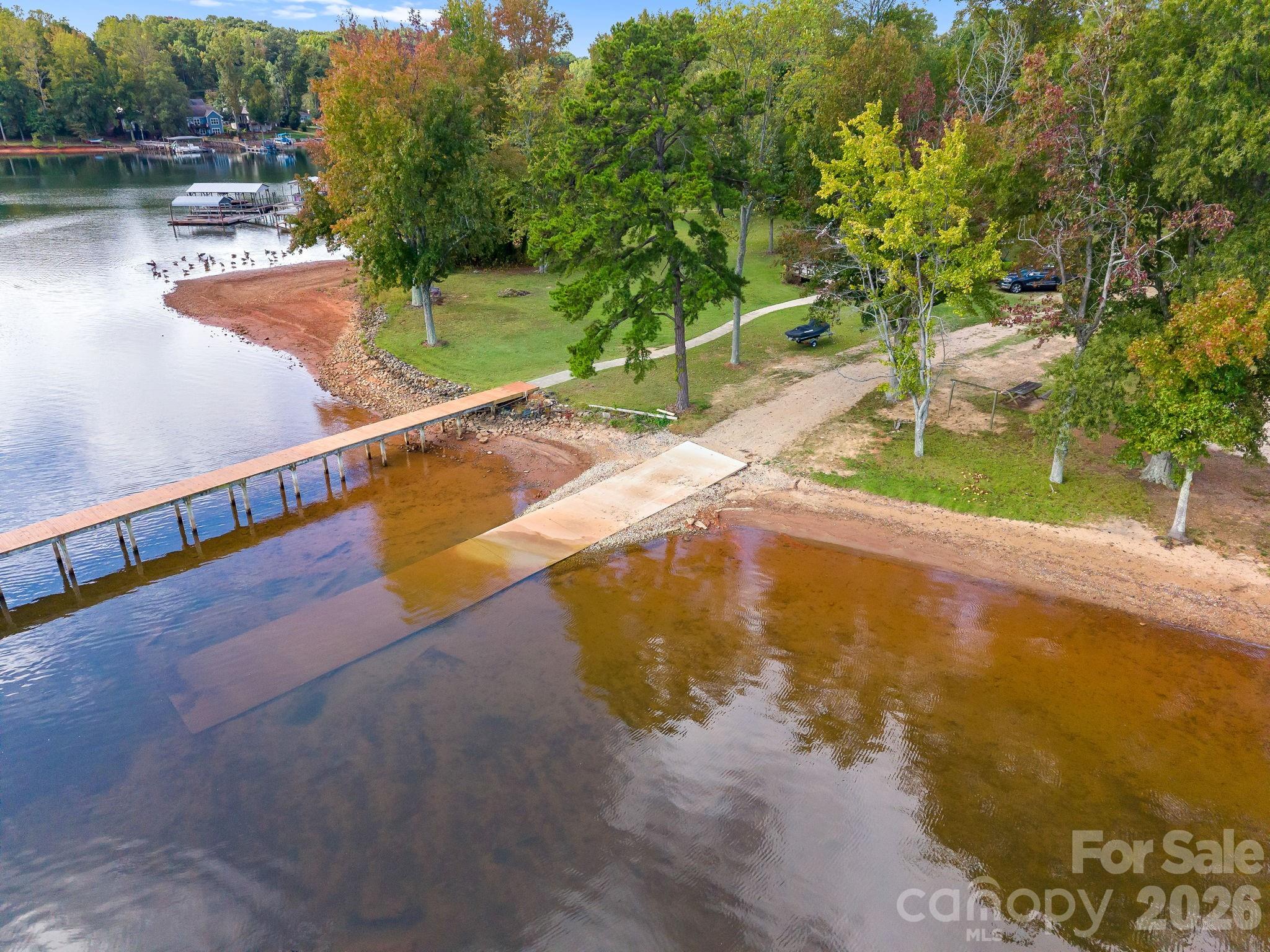 8078 Blackwood Road Denver, NC 28037 - Photo 47 of 48 a view of a lake with an outdoor space