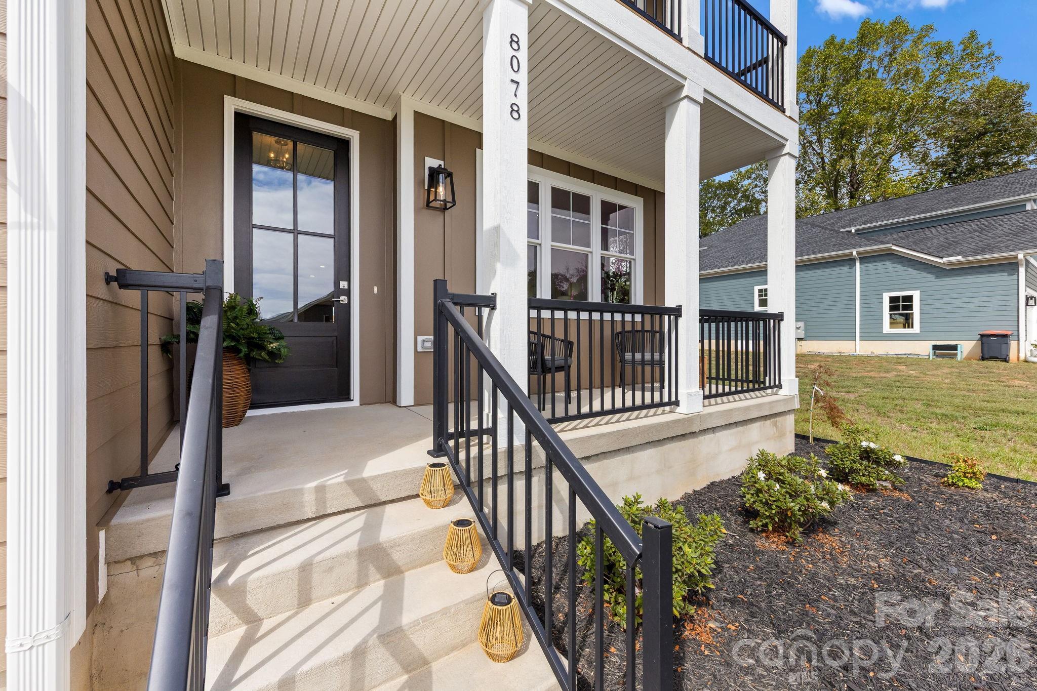 8078 Blackwood Road Denver, NC 28037 - Photo 6 of 48 front view of a house with a yard