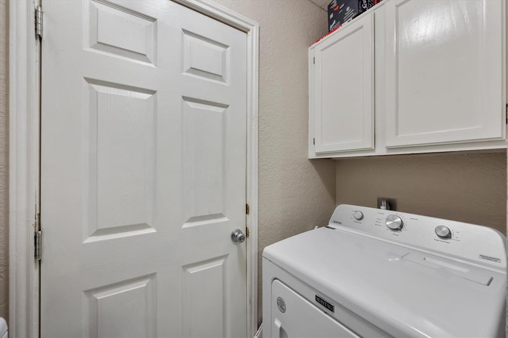 1312 Hackamore Street Mesquite, TX 75149 - Photo 14 of 28 a utility room with dryer and washer