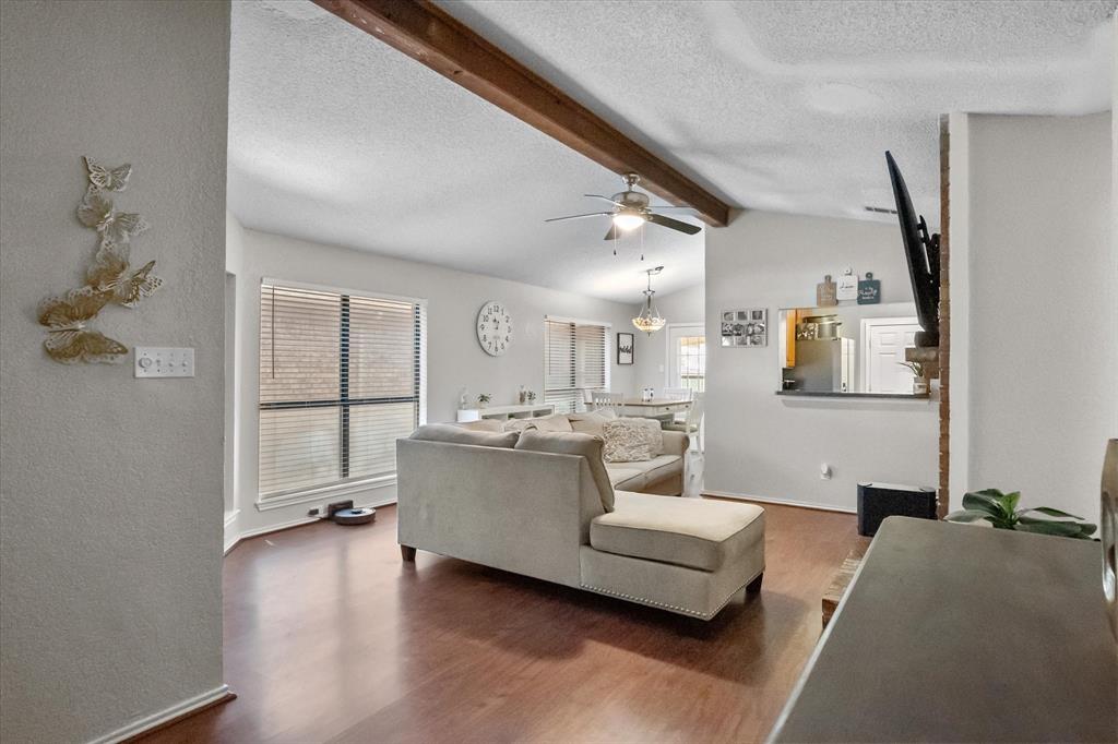 1312 Hackamore Street Mesquite, TX 75149 - Photo 17 of 28 a living room with furniture and a large window