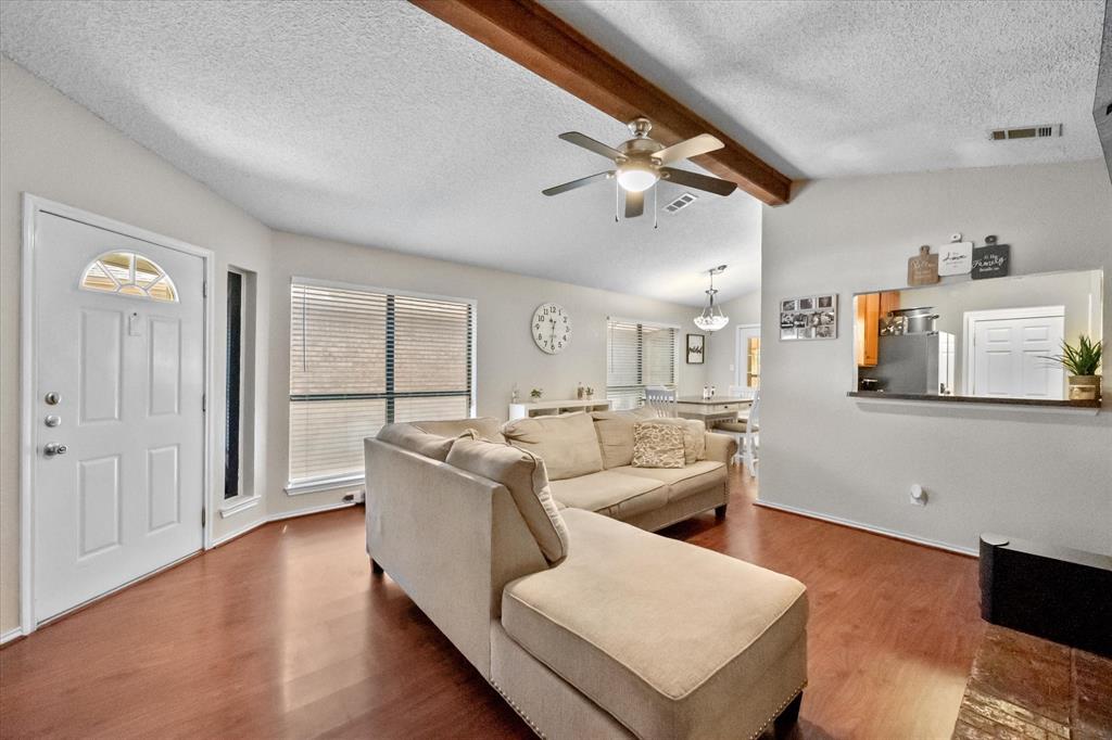 1312 Hackamore Street Mesquite, TX 75149 - Photo 18 of 28 a living room with furniture and a large window