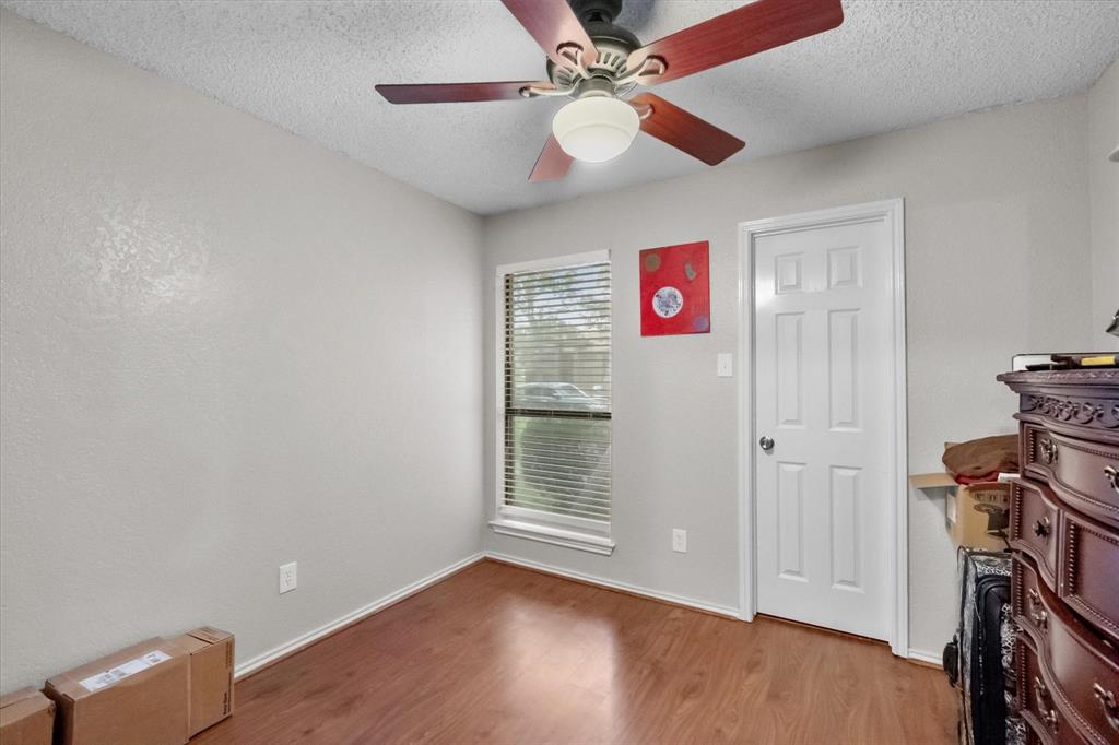 1312 Hackamore Street Mesquite, TX 75149 - Photo 19 of 28 a view of an entryway with wooden floor