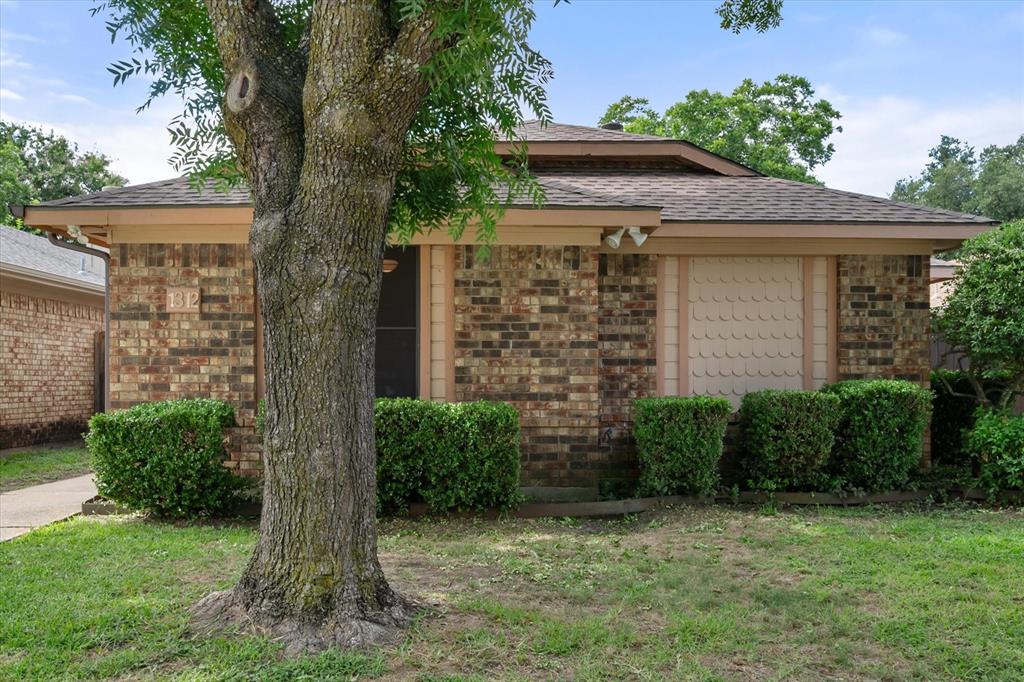 1312 Hackamore Street Mesquite, TX 75149 - Photo 2 of 28 a view of a house with a yard