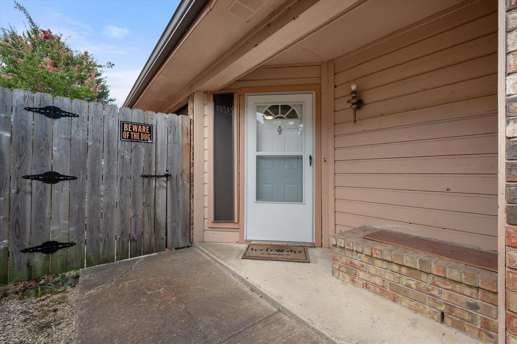 1312 Hackamore Street Mesquite, TX 75149 - Photo 4 of 28 a view of a door and wooden wall