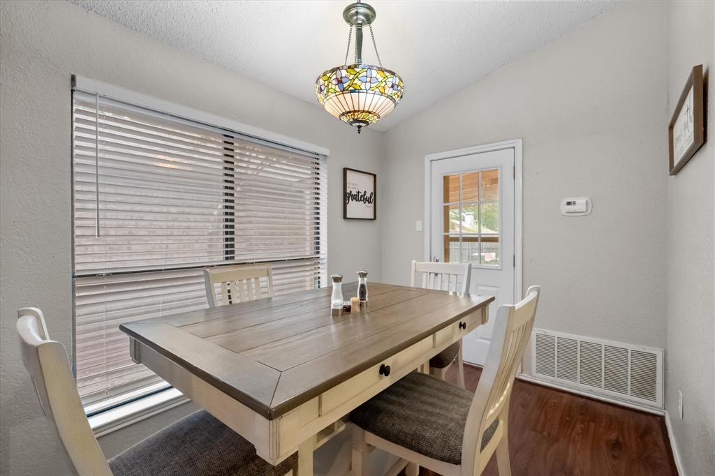 1312 Hackamore Street Mesquite, TX 75149 - Photo 9 of 28 a dining room with furniture and window