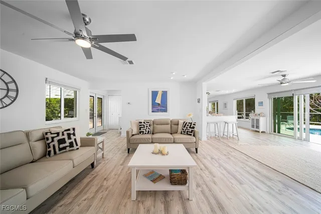 a bathroom with a toilet sink and shower