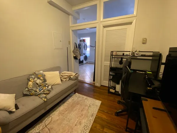 a bed room with a bed and furniture