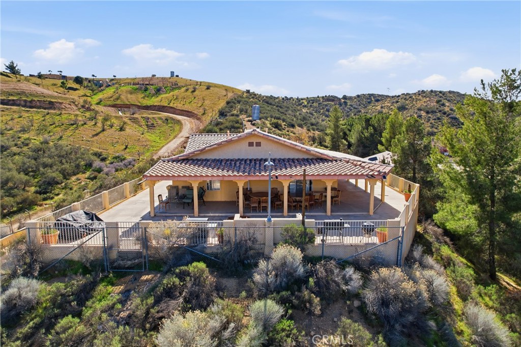 14455 Summit Valley Road Hesperia, CA 92345 - Photo 18 of 26 a view of a large building with a mountain in the background
