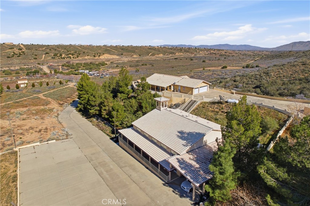 14455 Summit Valley Road Hesperia, CA 92345 - Photo 21 of 26 an aerial view of house with yard