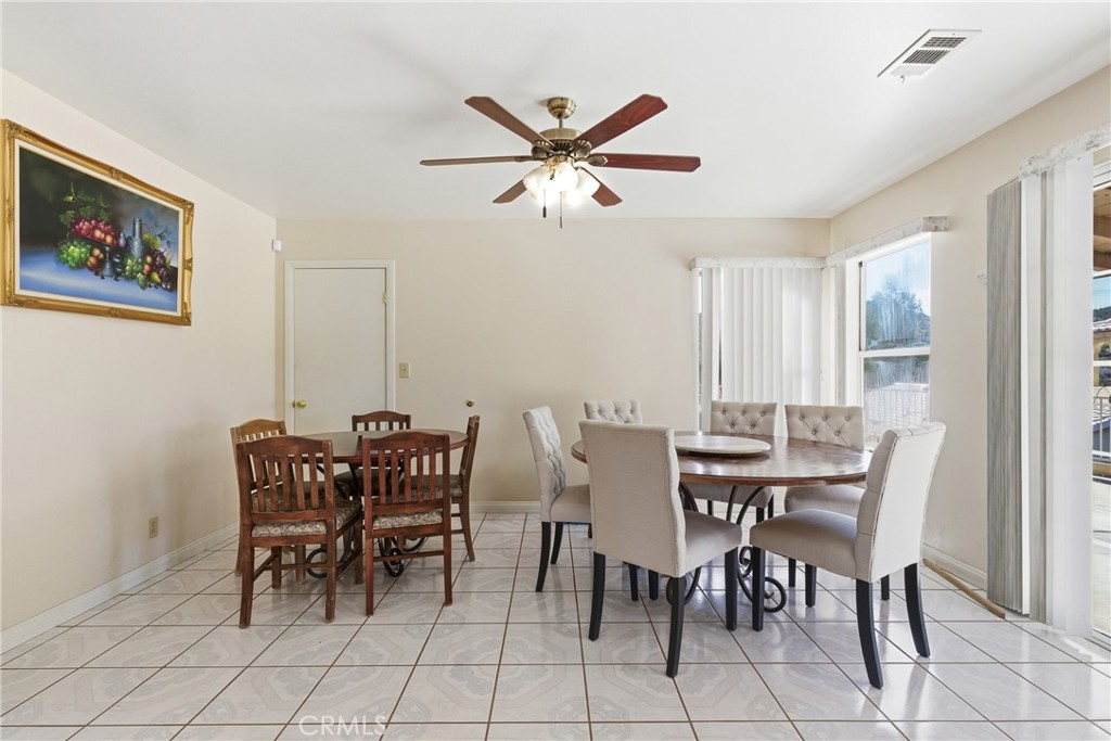 14455 Summit Valley Road Hesperia, CA 92345 - Photo 5 of 26 a view of a dining room with furniture