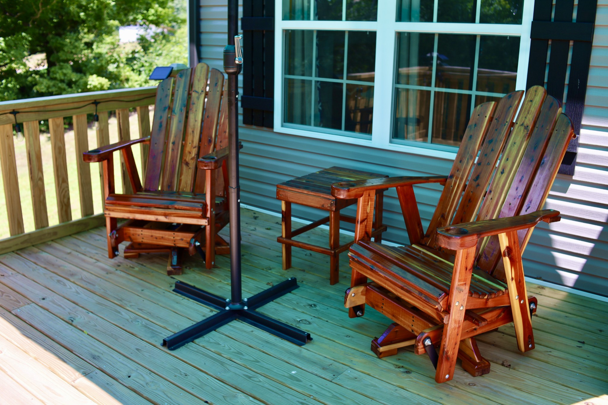 746 Nels Adams Road Dickson, TN 37055 - Photo 35 of 63 a backyard of a house with wooden floor and outdoor seating