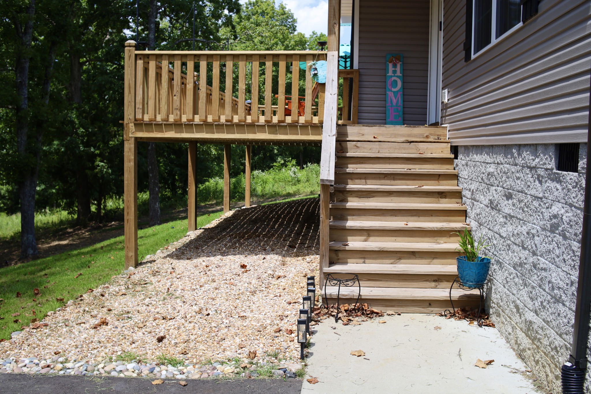 746 Nels Adams Road Dickson, TN 37055 - Photo 45 of 63 a wooden bench sitting in front of a house