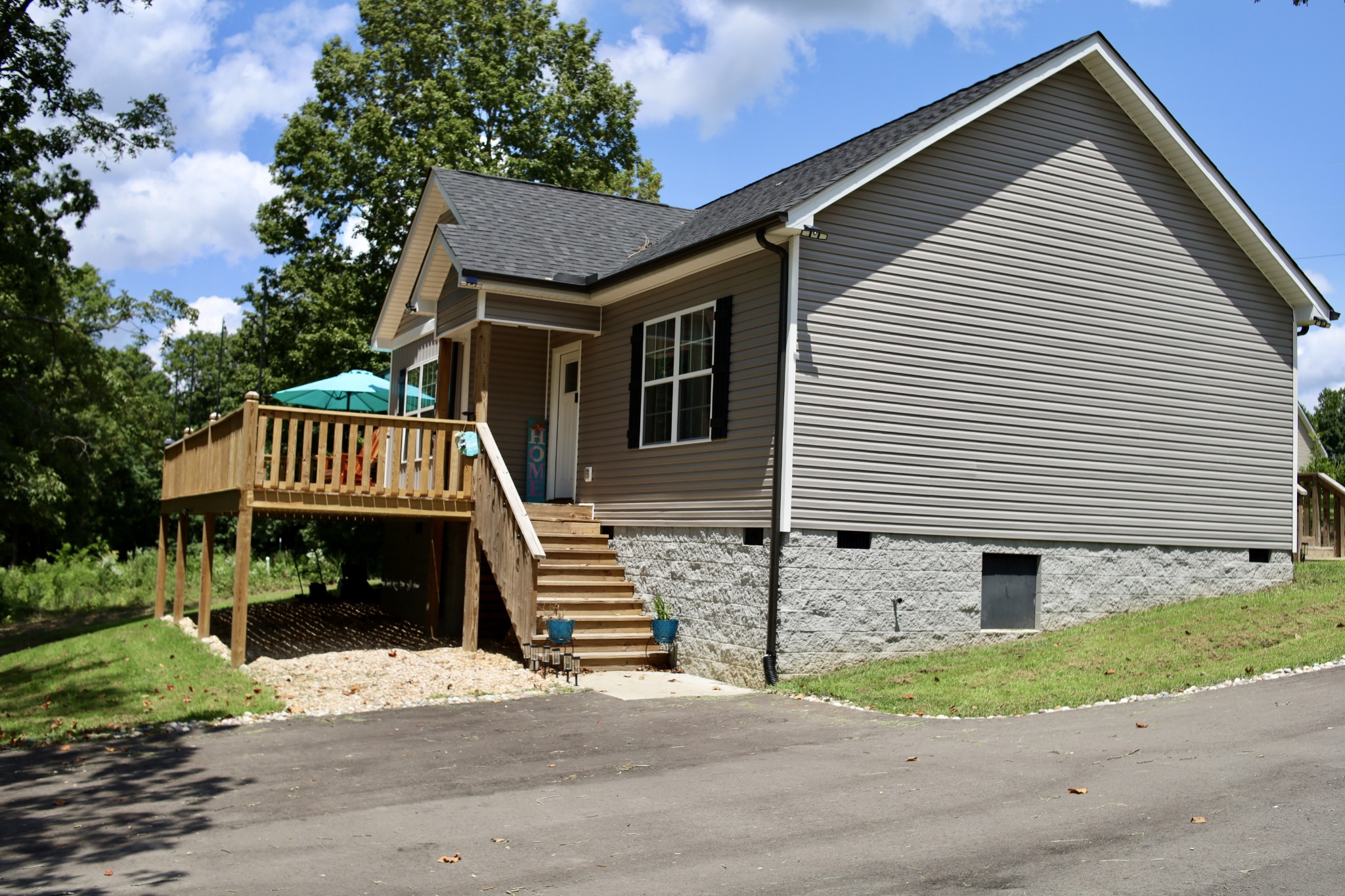 746 Nels Adams Road Dickson, TN 37055 - Photo 46 of 63 a front view of a house with a yard