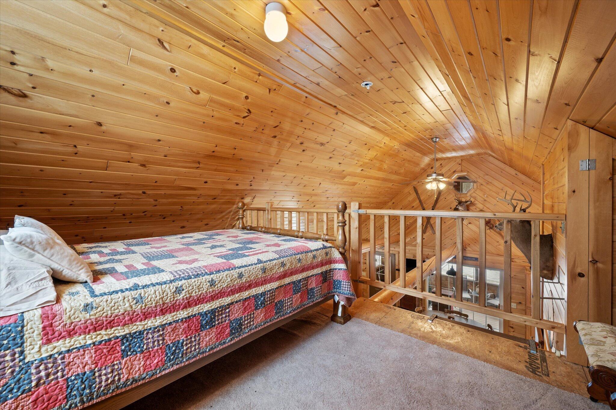 25 Wisdom Road Island Falls, ME 04747 - Photo 30 of 46 28-Loft_Bedroom 3