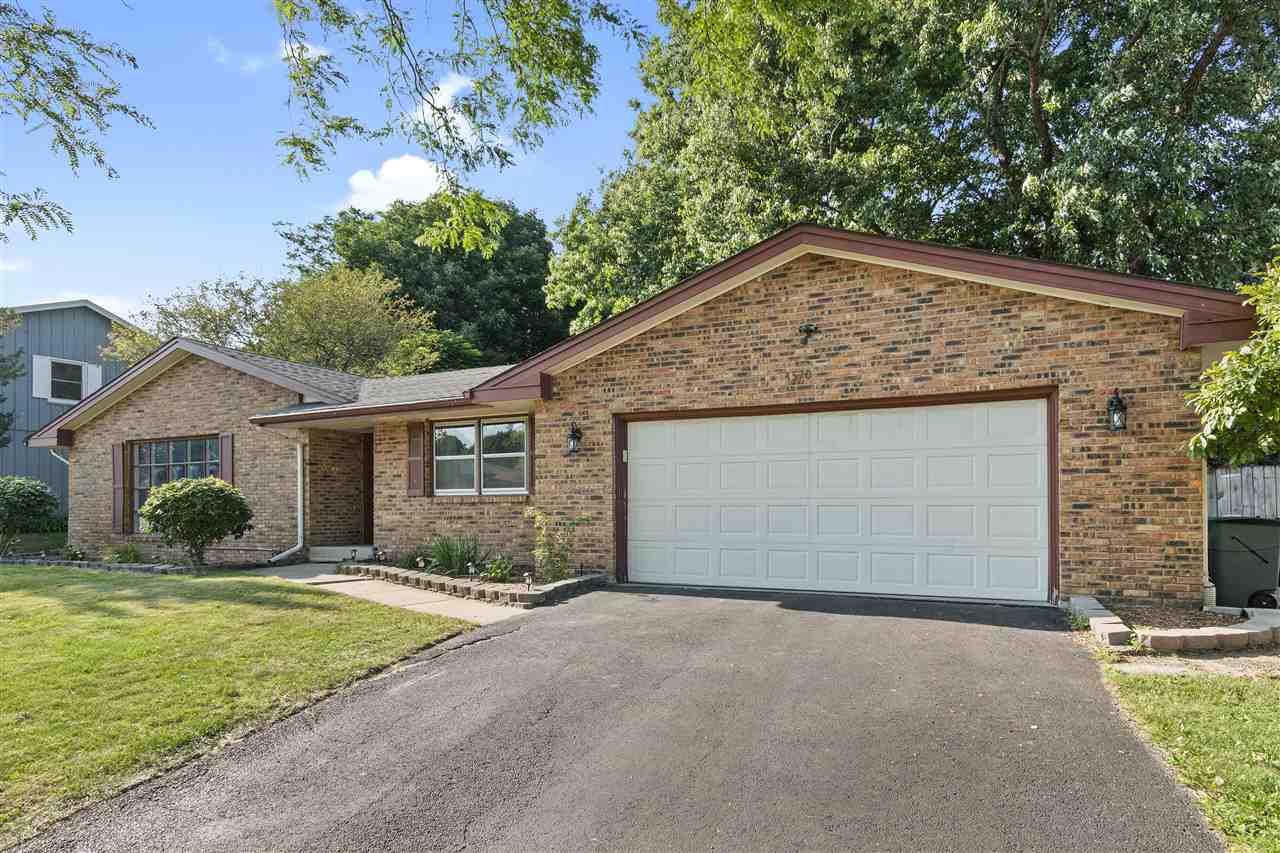 4570 Sunderman Road Rockford, IL 61114 - Photo 2 of 17 a house view with a outdoor space