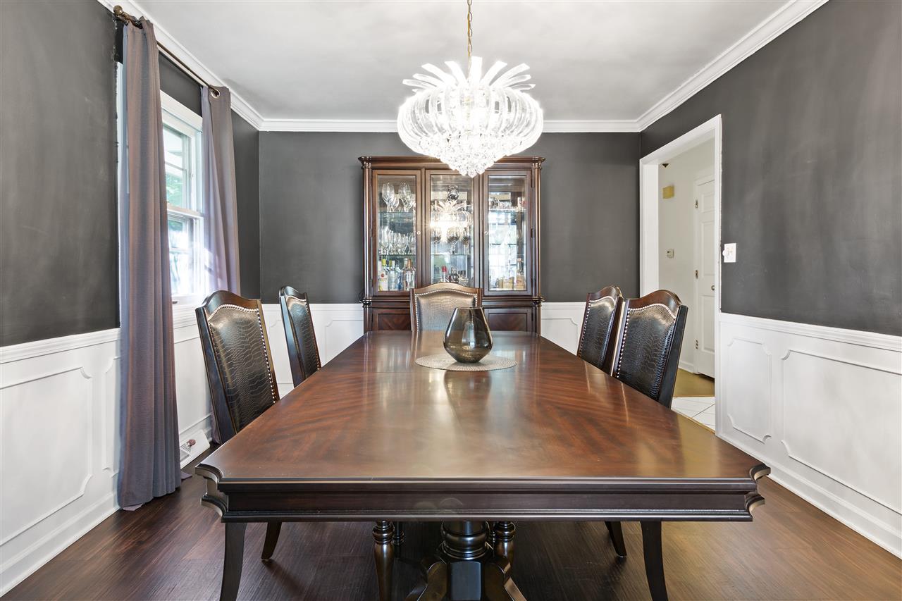 4570 Sunderman Road Rockford, IL 61114 - Photo 6 of 17 a view of a dining room with furniture window and wooden floor