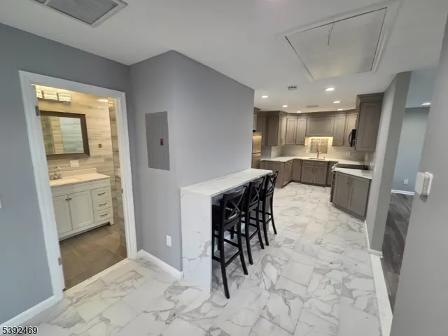 a view of a kitchen and dining room