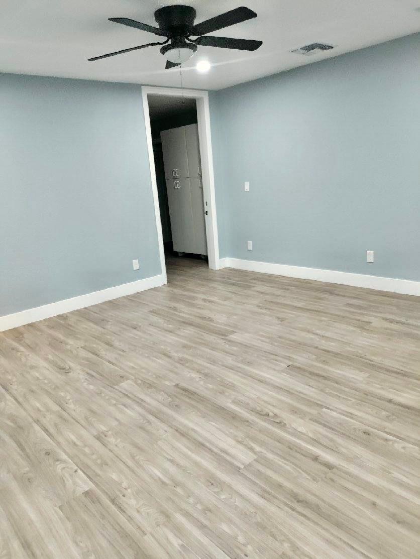 2653 Princeton Street Sacramento, CA 95815 - Photo 7 of 10 a view of an empty room with a chandelier