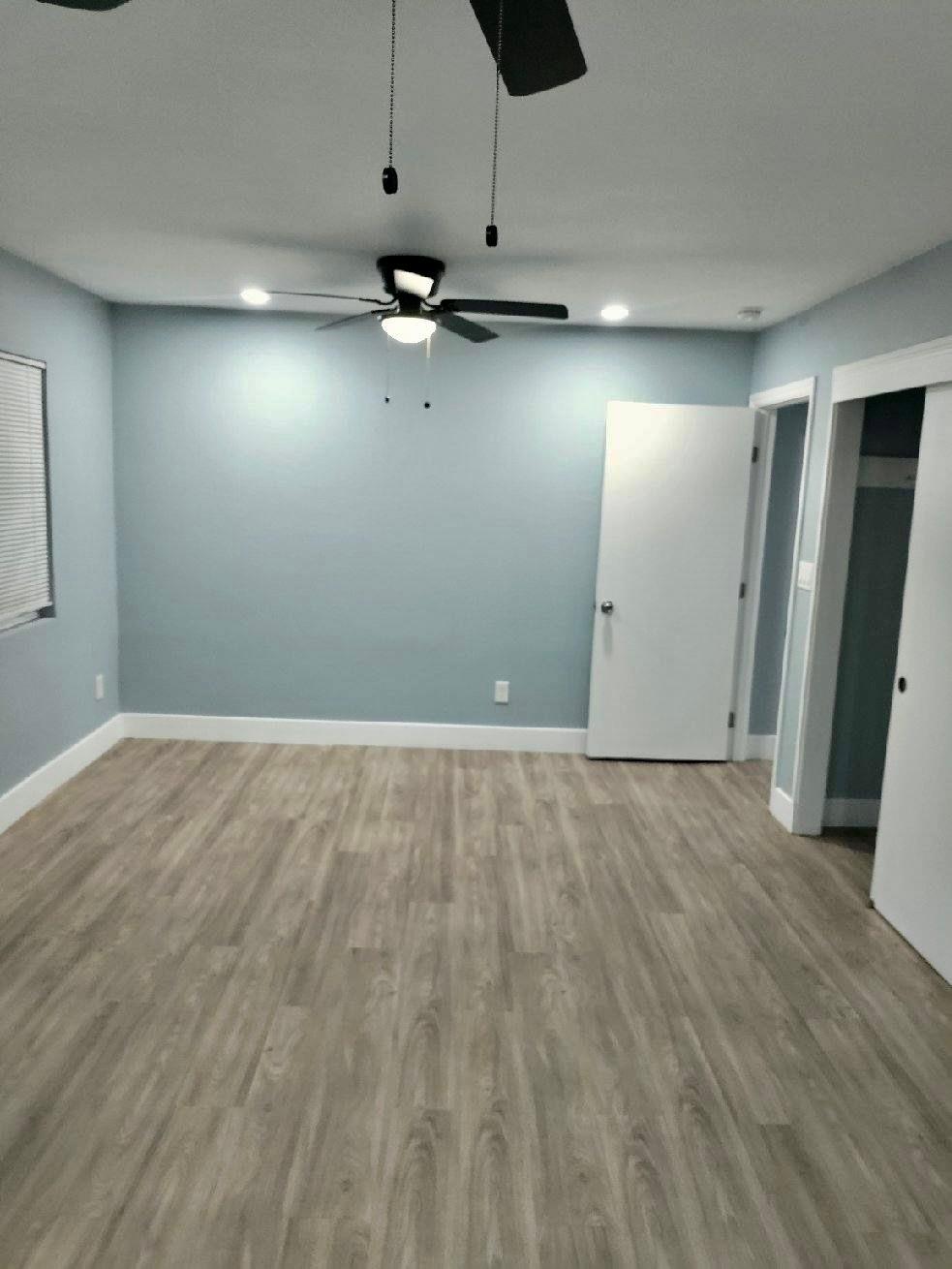 2653 Princeton Street Sacramento, CA 95815 - Photo 9 of 10 an empty room with wooden floor