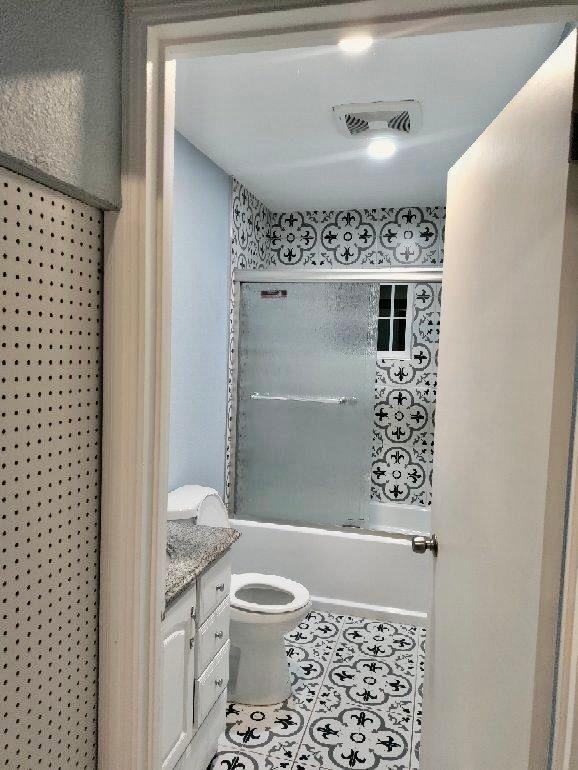 2653 Princeton Street Sacramento, CA 95815 - Photo 10 of 10 a bathroom with a toilet and a shower