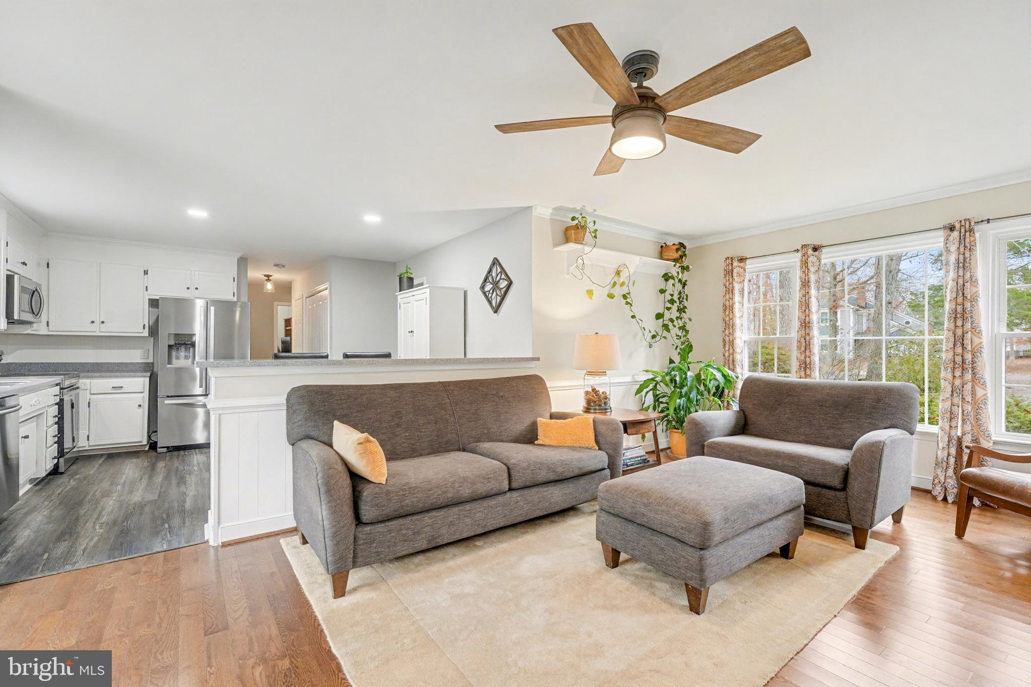 1114 John Paul Jones Drive Stafford, VA 22554 - Photo 15 of 74 a living room with furniture kitchen view and a large window