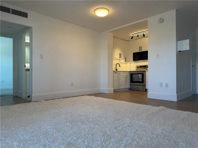 a view of a kitchen and a sink