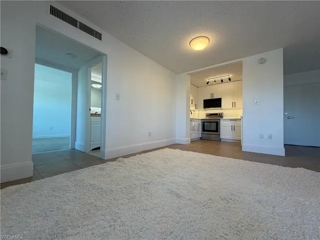 a view of livingroom with furniture and window