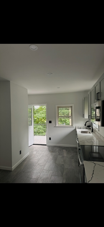 19 Dell Avenue, Unit 2 Boston, MA 02136 - Photo 2 of 6 a view of livingroom with furniture and window