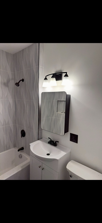 19 Dell Avenue, Unit 2 Boston, MA 02136 - Photo 3 of 6 a bathroom with a sink and mirror