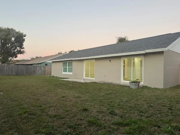 a house view with a garden space